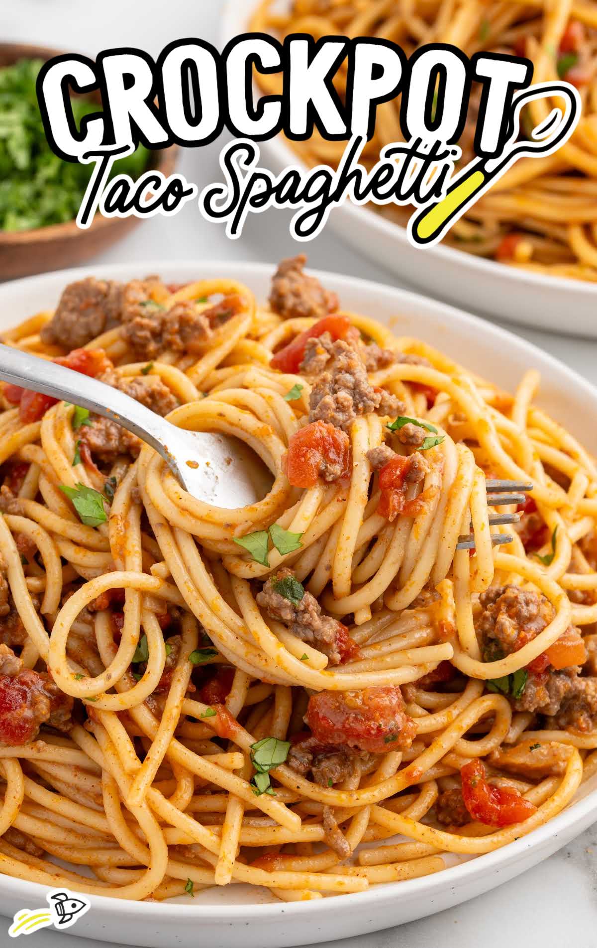 Crockpot taco spaghetti with seasoned ground beef and tender spaghetti noodles