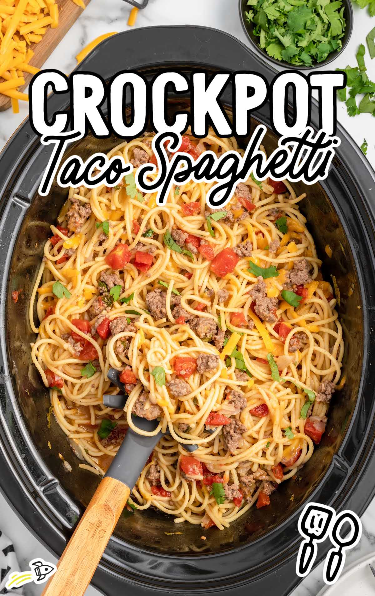 overhead shot of a crockpot of Taco Spaghetti