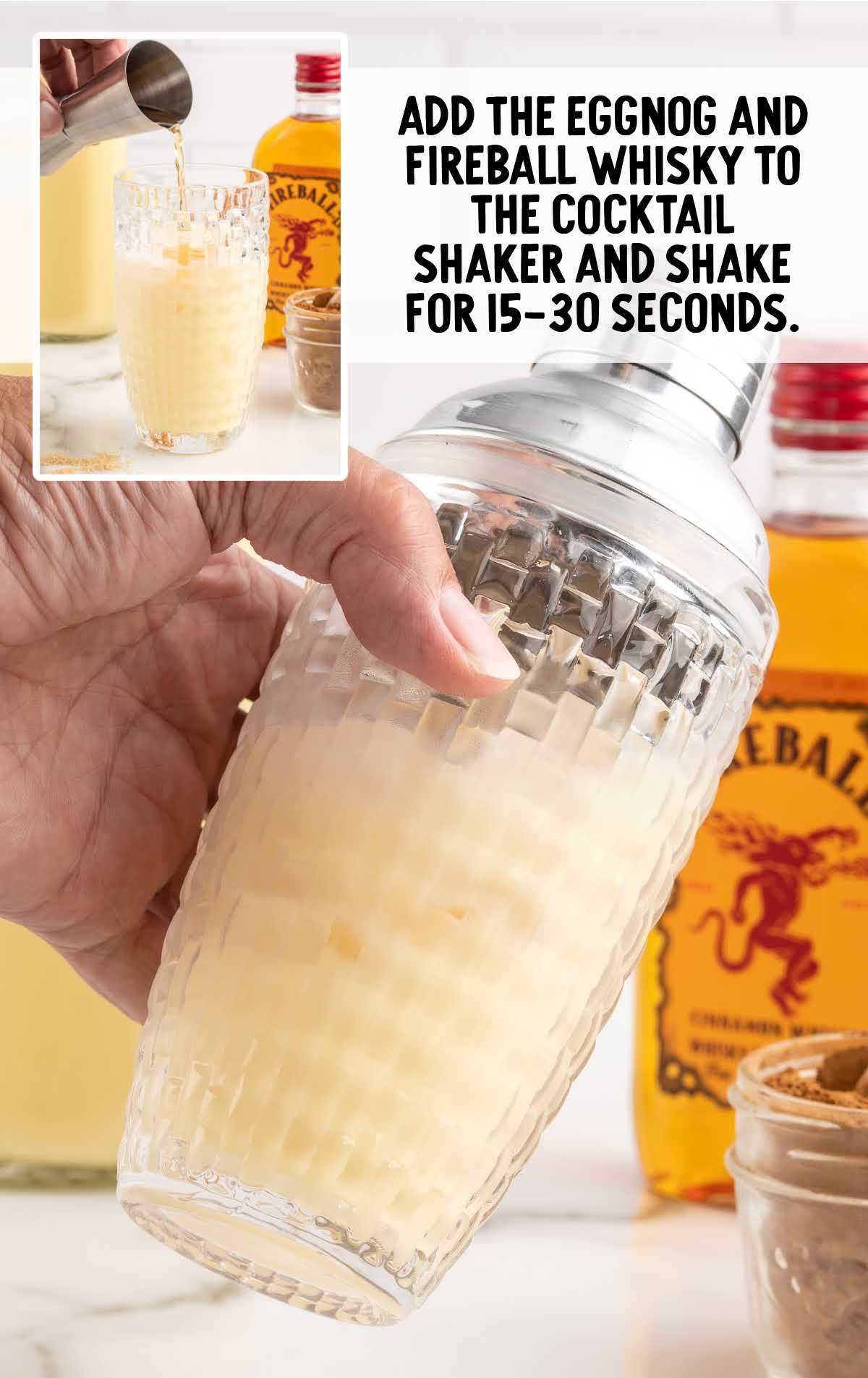 eggnog and fireball whiskey combined in a shaker glass