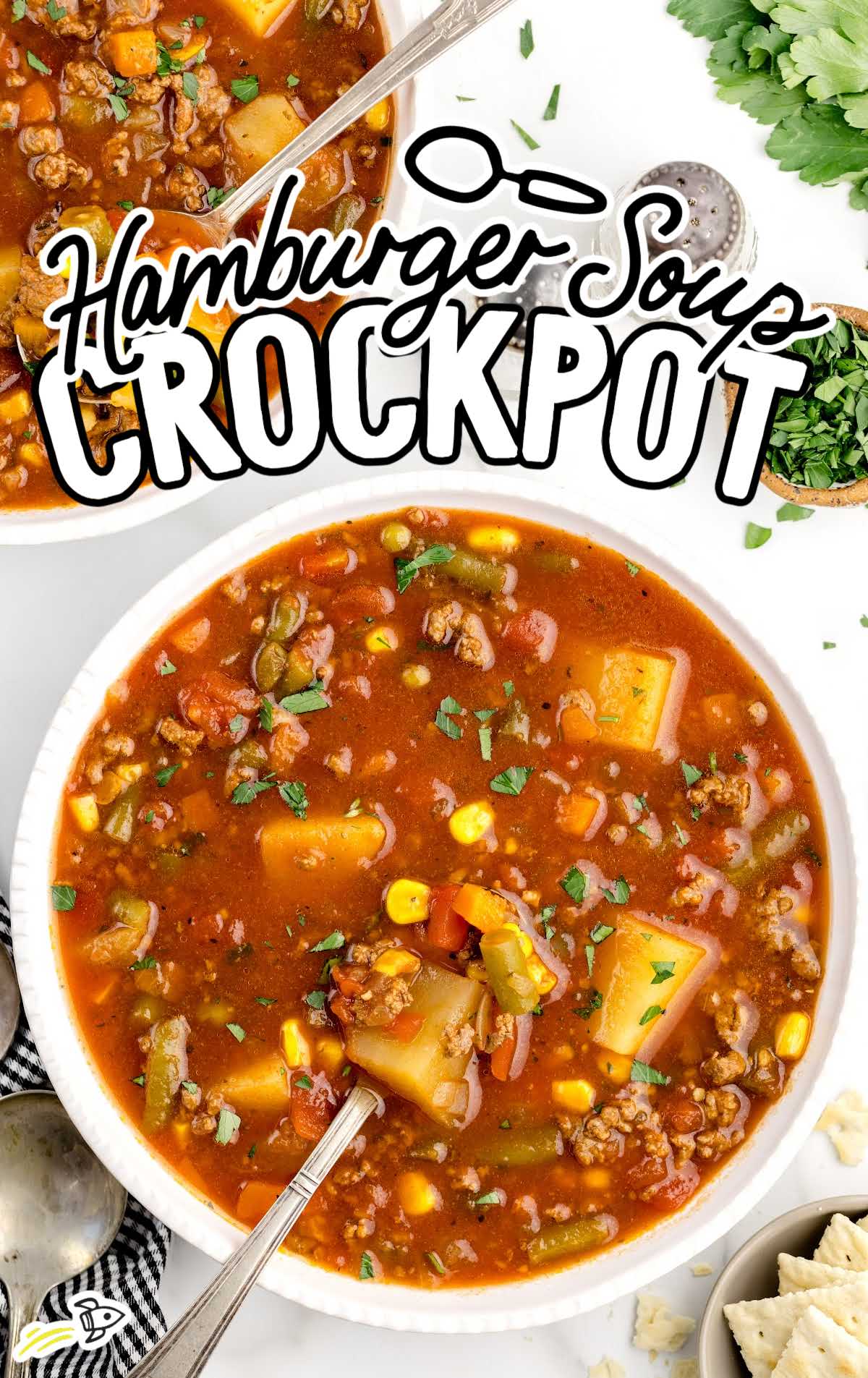 overhead shot of Hamburger Soup Crockpot with a spoon in a bowl