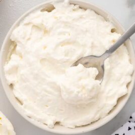 overhead shot of Mascarpone Frosting in a bowl