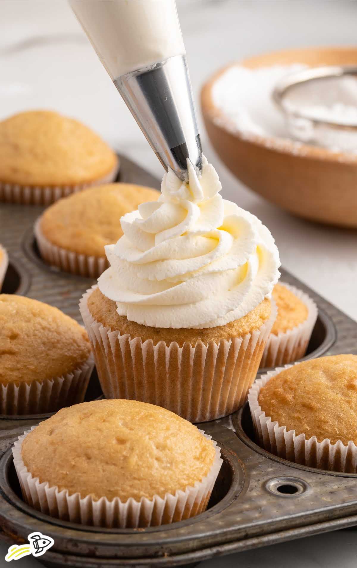 a close up shot of Mascarpone Frosting on a cupcake