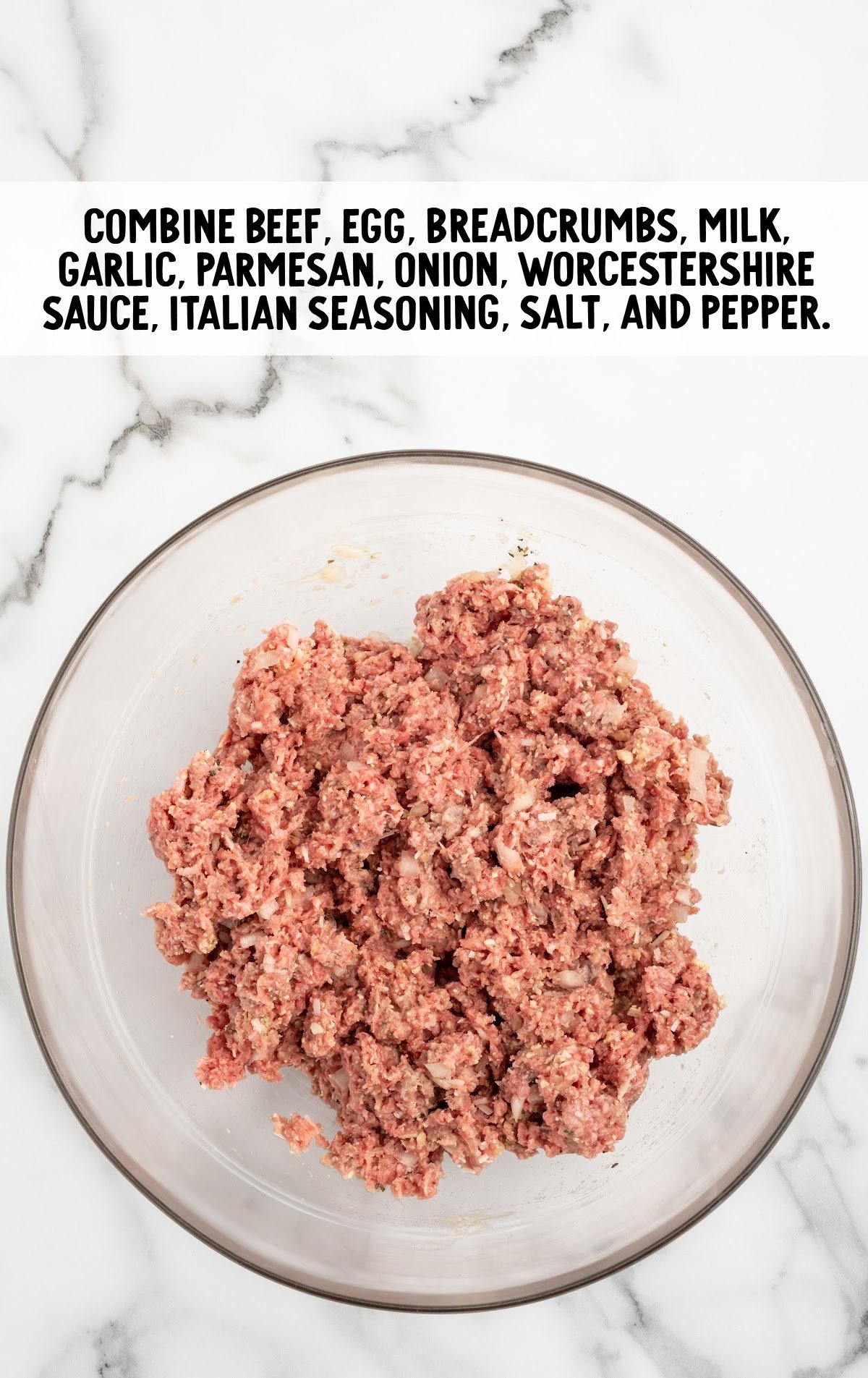 ground beef, finely diced yellow onion, breadcrumbs, minced garlic, egg, ketchup, mustard, Worcestershire sauce, salt, pepper, and chopped parsley added to a large bowl
