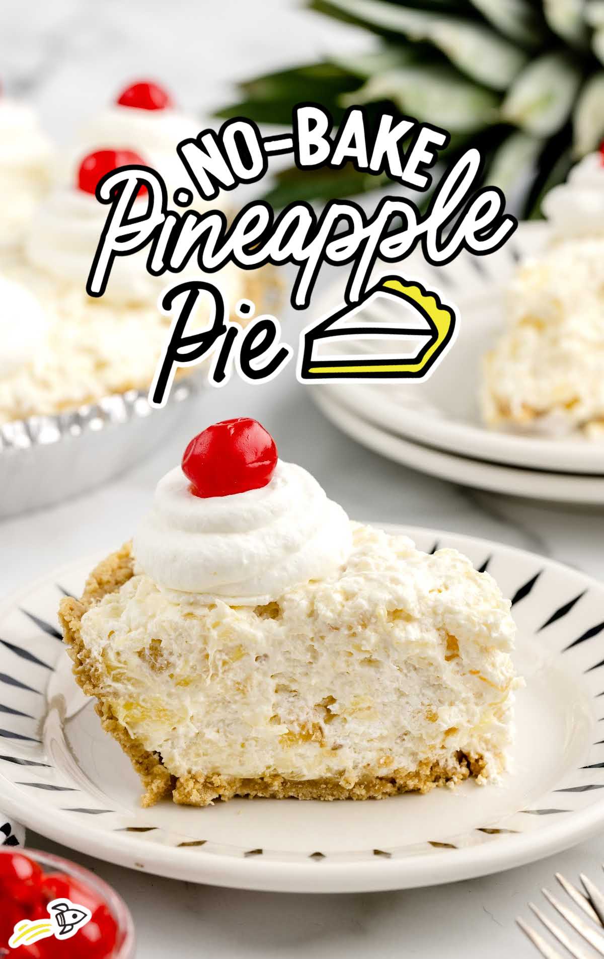a slice of Pineapple Pie topped with whipped cream and a cherry on a plate