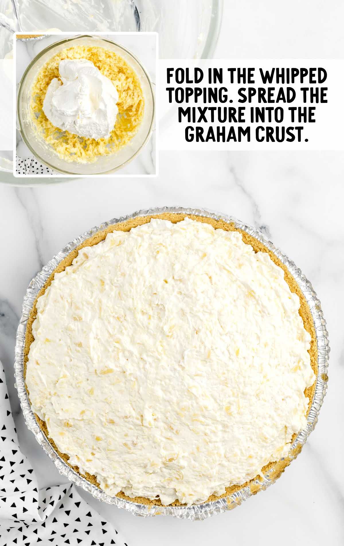 whipped cream folded into the pineapple mixture and placed into the graham cracker crust