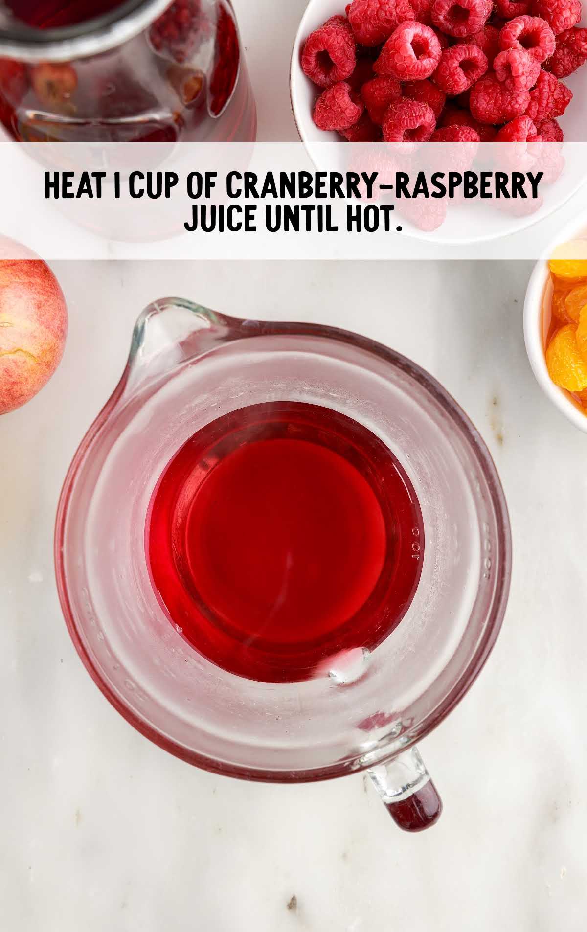 cranberry raspberry juice added to the measuring cup