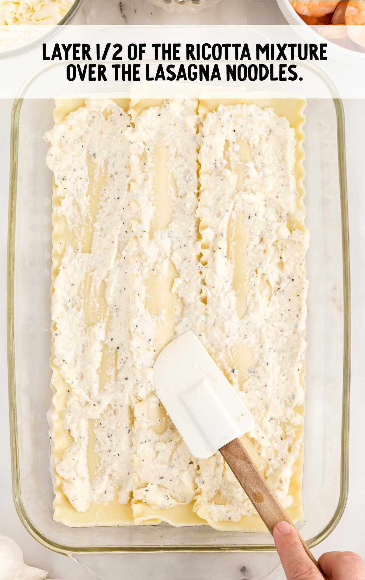 ricotta mixture layered over the lasagna noodles