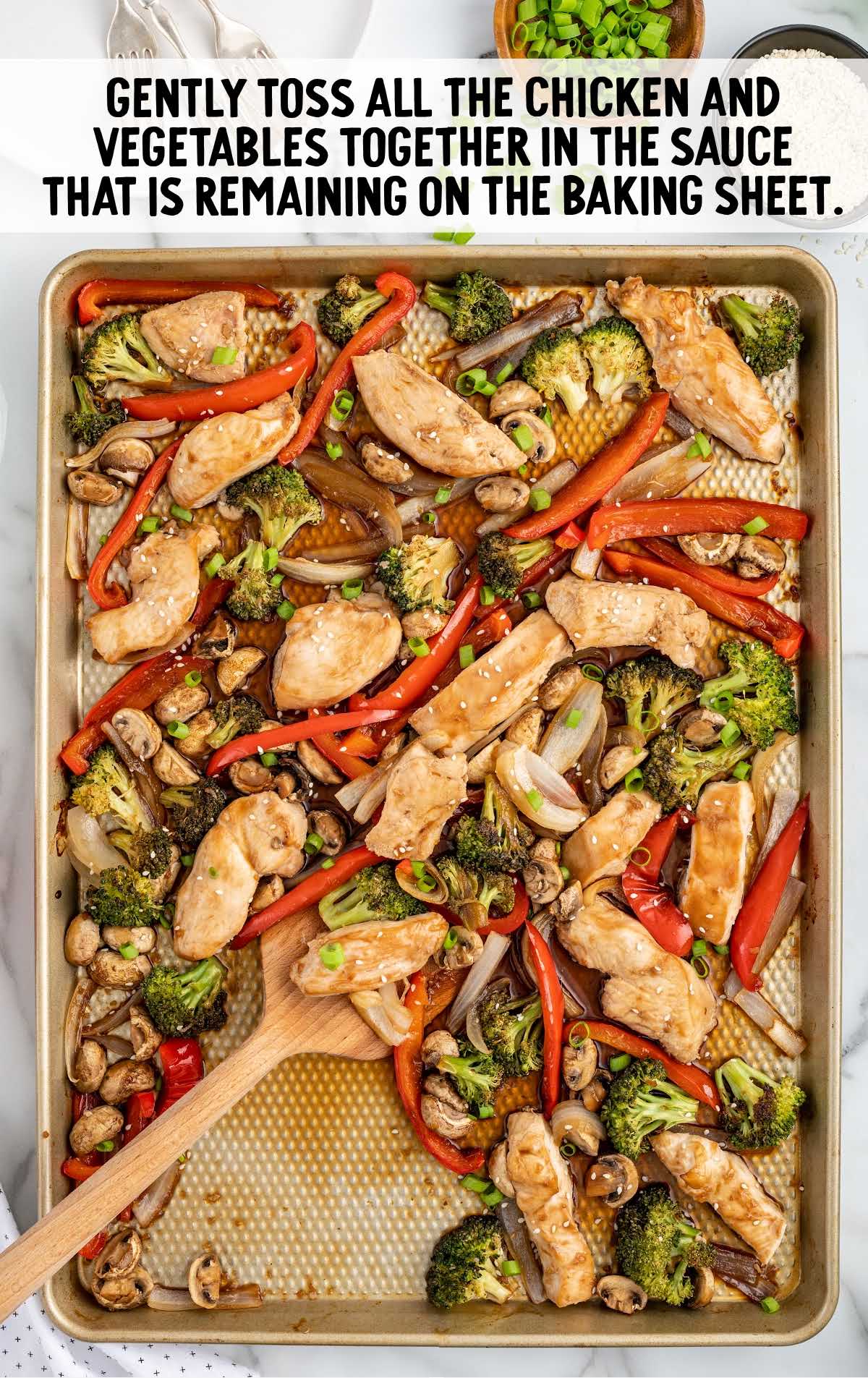 chicken and vegetables tossed in the sauce