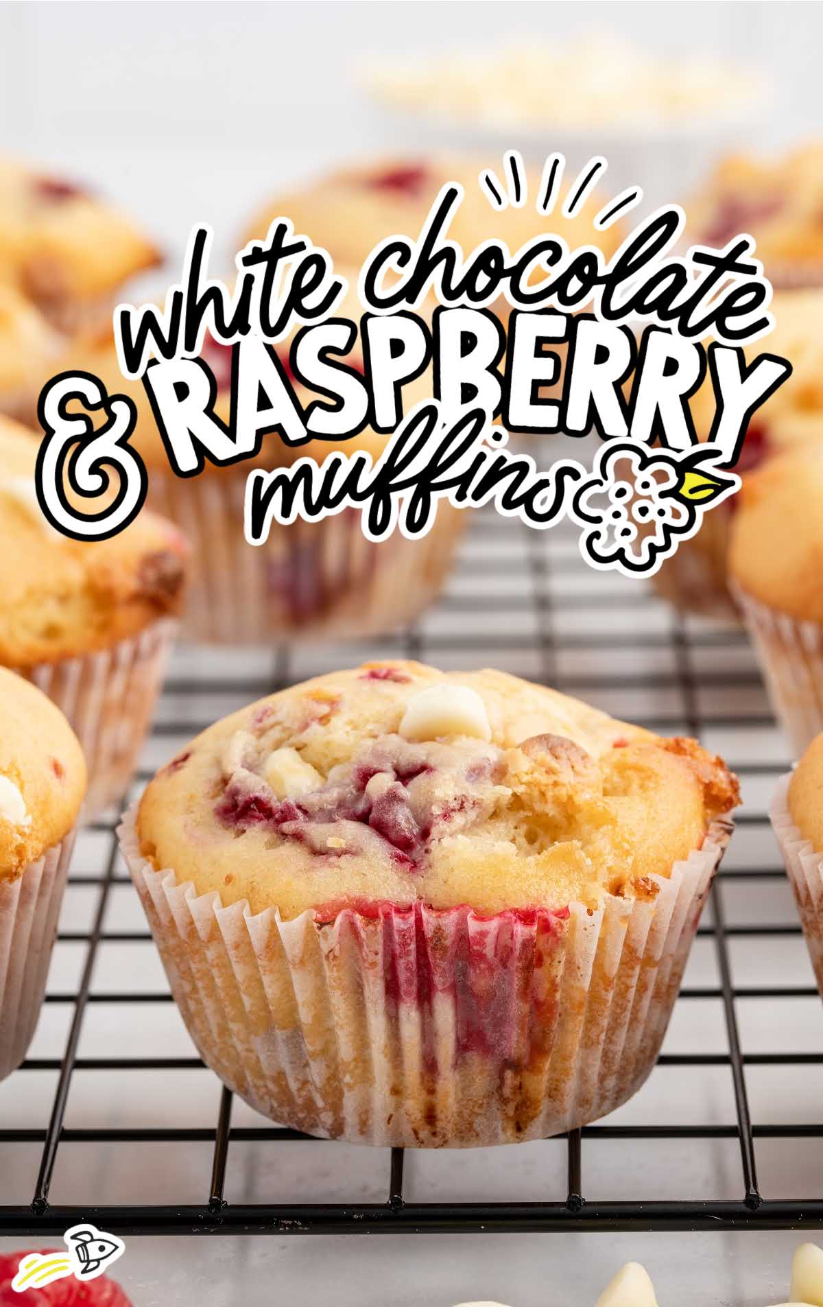 White Chocolate and Raspberry Muffins on a cooling rack