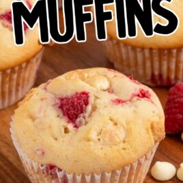 White Chocolate and Raspberry Muffins on a wooden board
