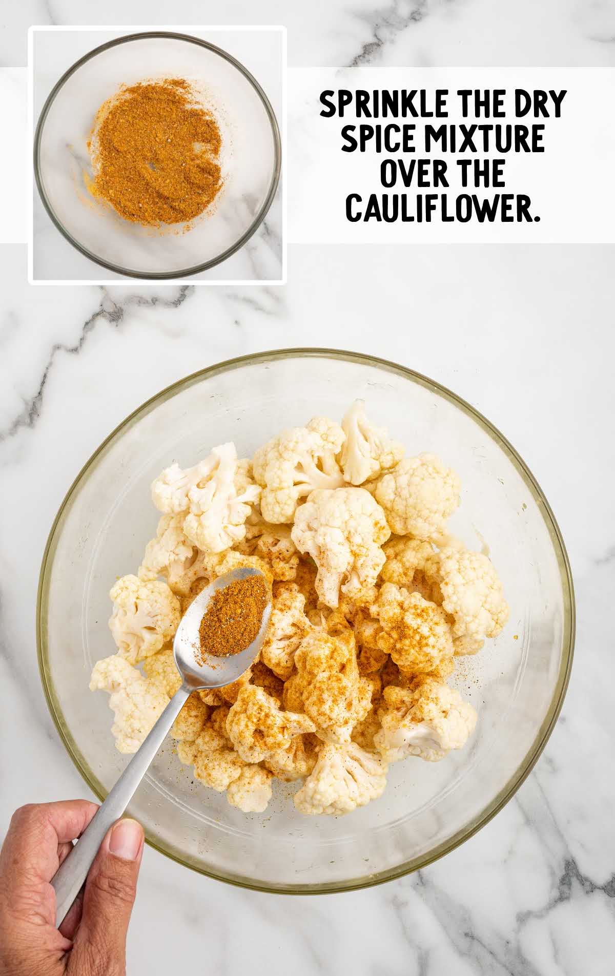 dry spice mix sprinkled over the cauliflower in a bowl