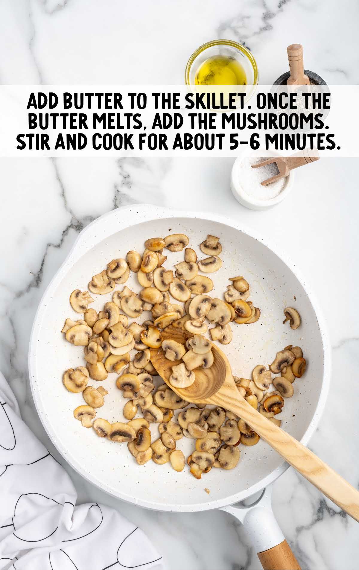butter and mushrooms added to the skillet