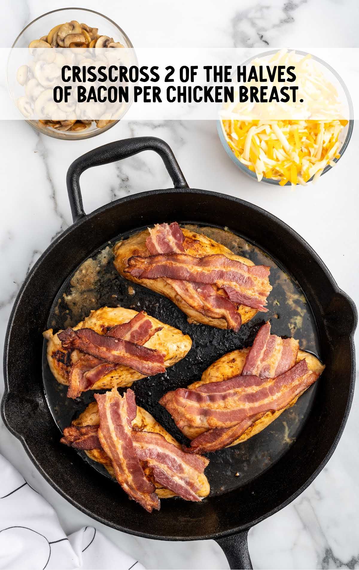 bacon placed on top of the skillet in a skillet