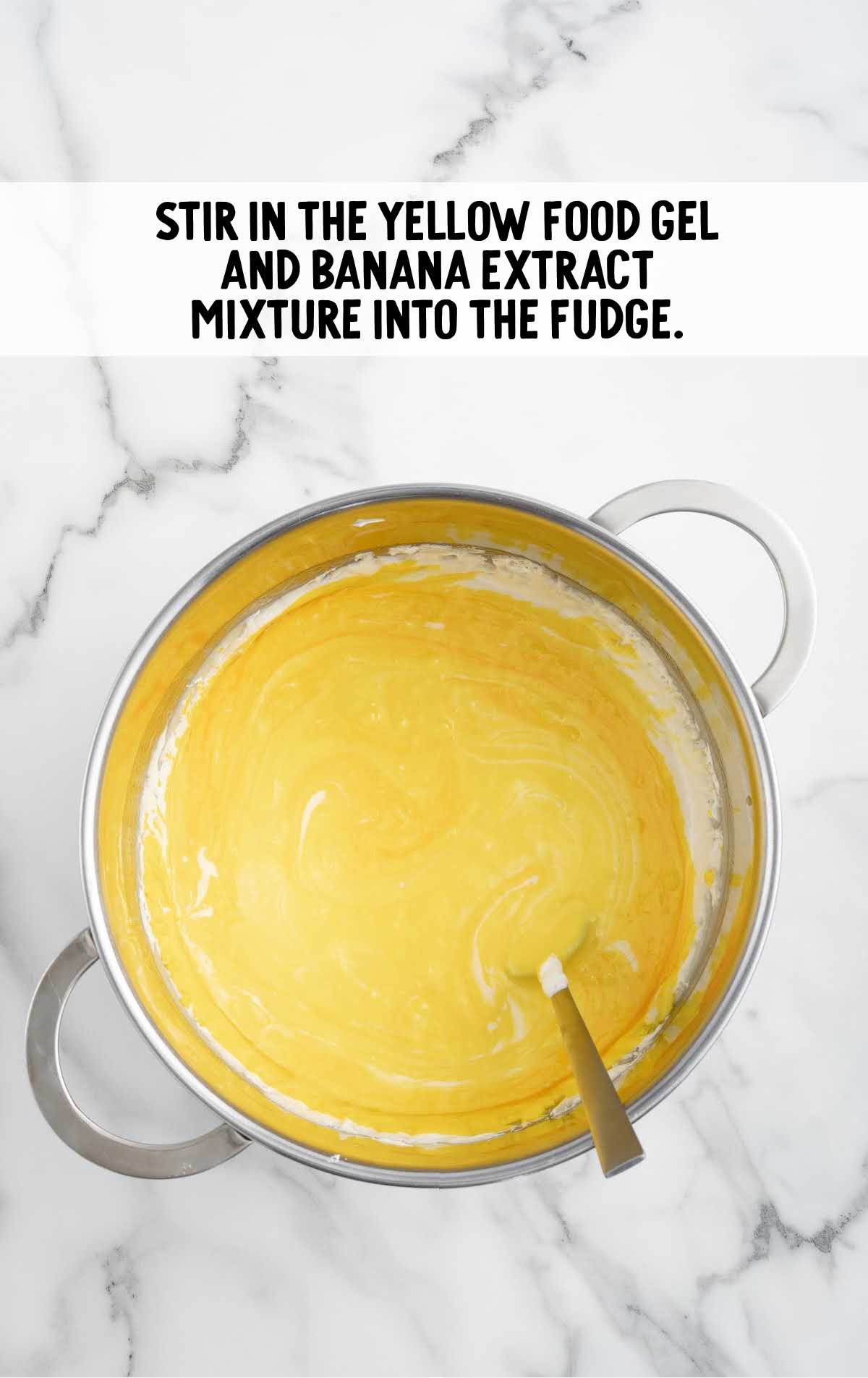 yellow food gel and banana extract mixture stirred into the fudge