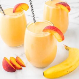 close up shot of Banana Peach Smoothie in a glass