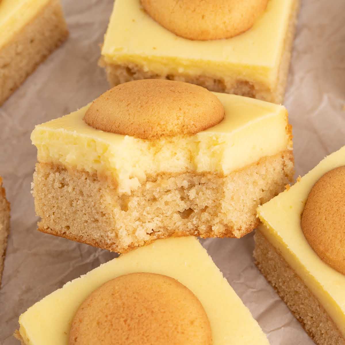 close up of Banana Pudding Brownies with a bite taken out of one of the brownies
