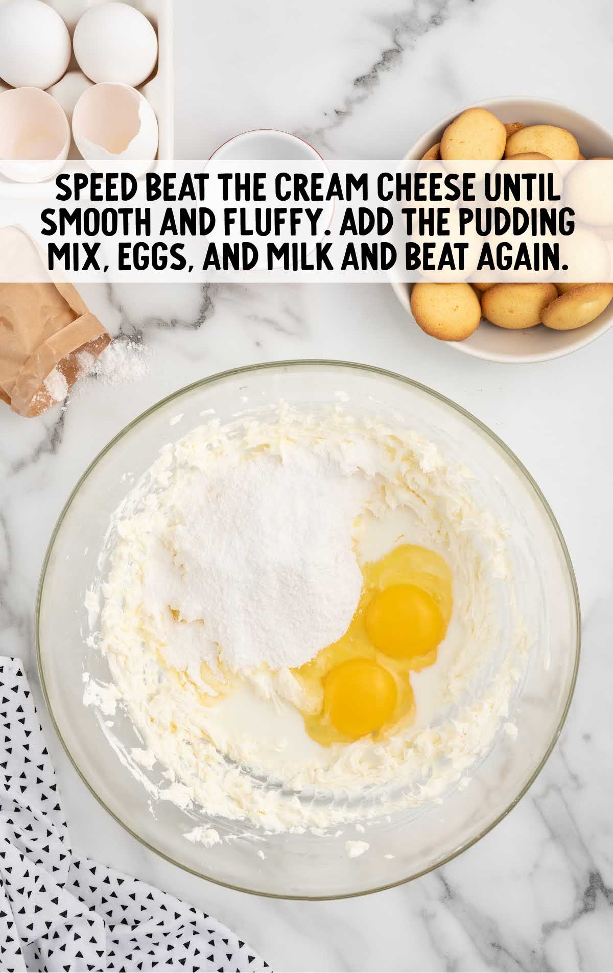 cream cheese, pudding mix, eggs, and milk combined in a bowl