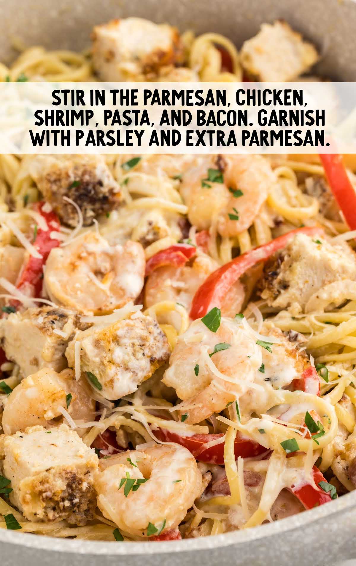 parmesan, chicken, shrimp, pasta, and bacon stirred together