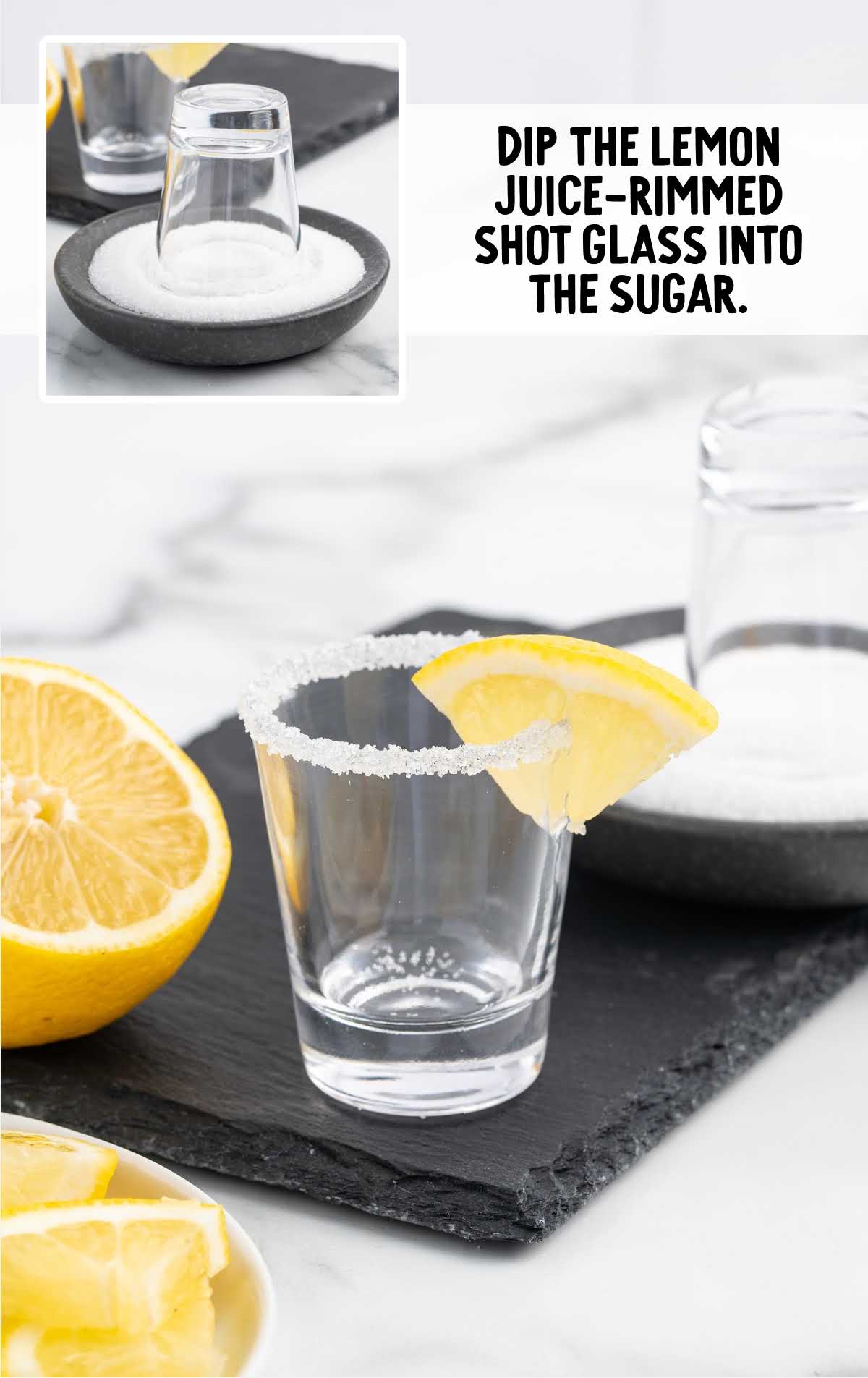 shot glass dipped into the sugar and garnished with a slice of lemon