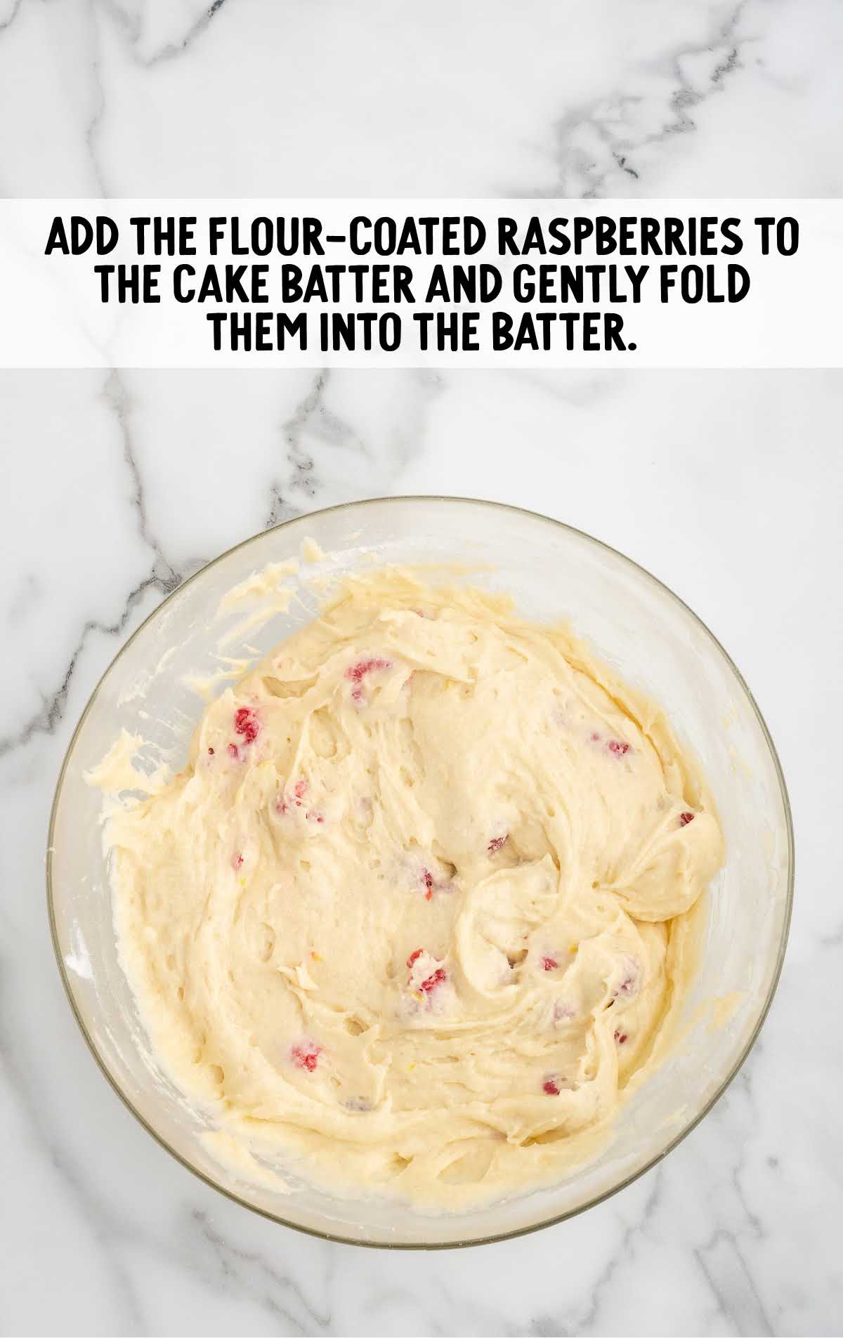 flour-coated raspberries folded into the cake batter