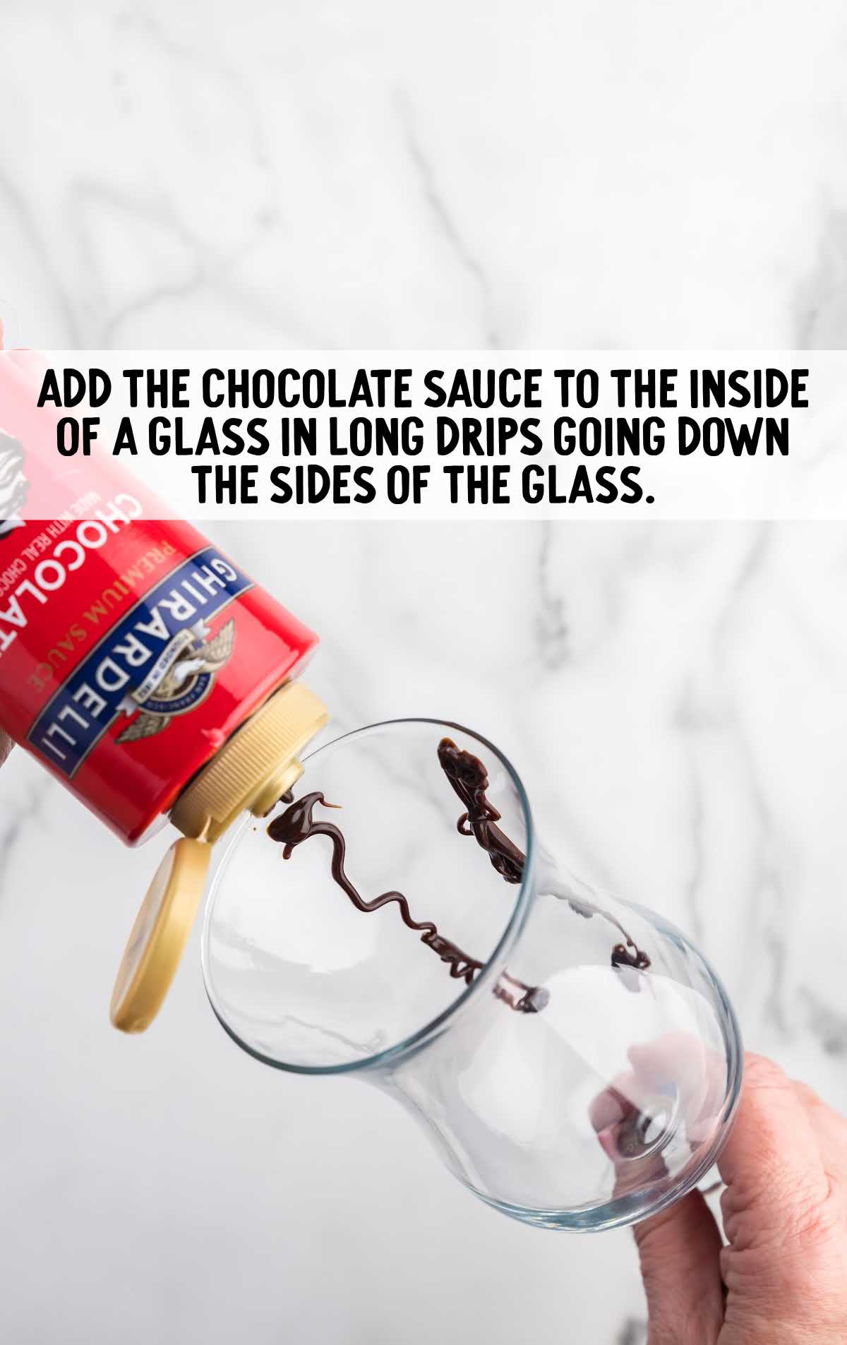 chocolate sauce drizzled on the glass