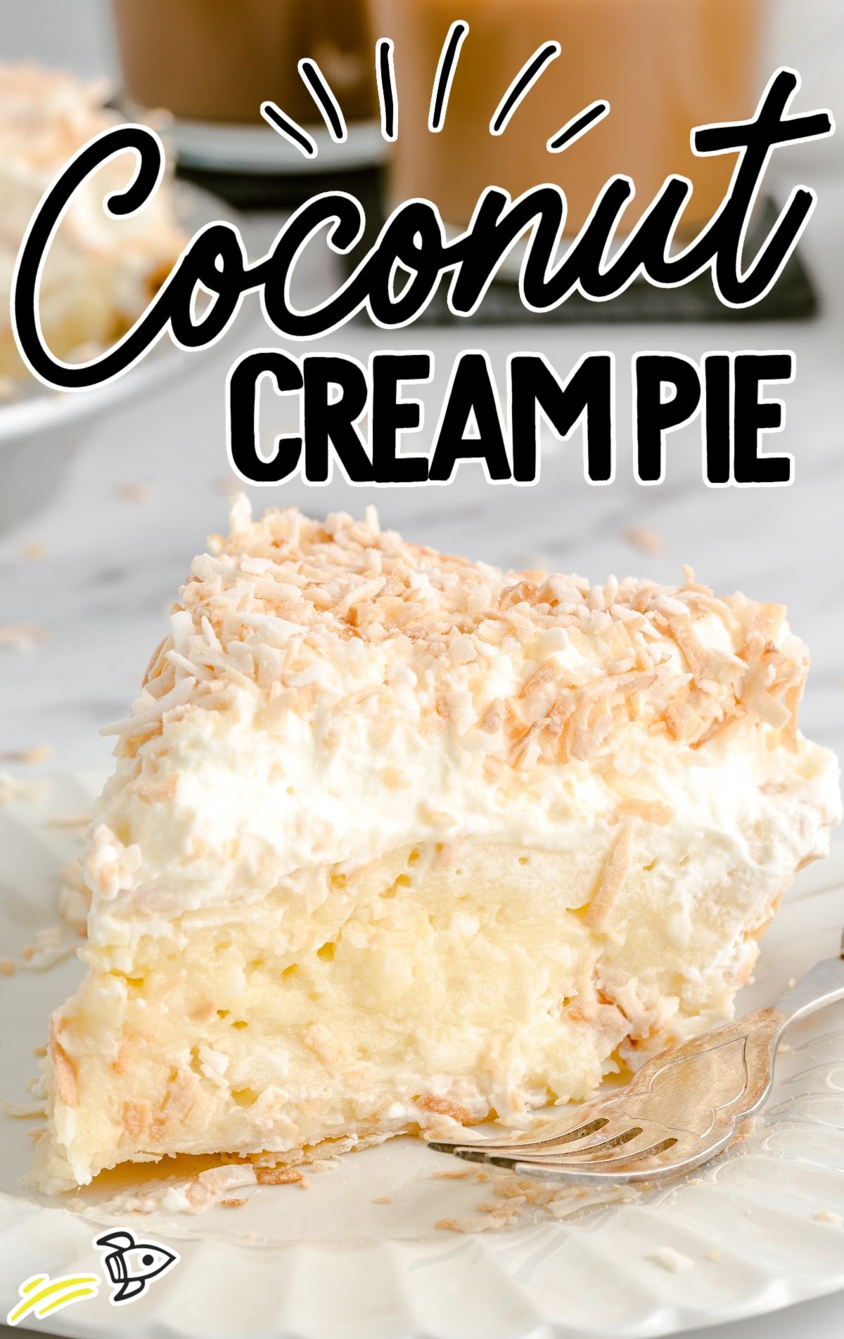 a slice of Coconut Cream Pie on a plate with a fork
