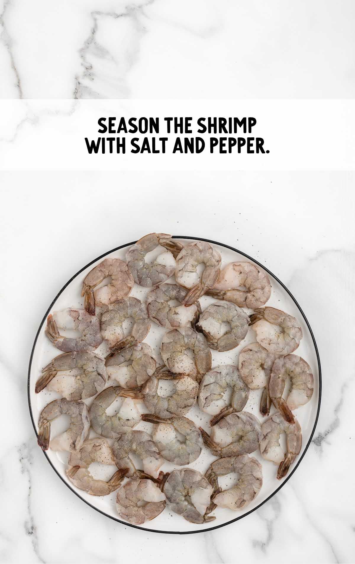 shrimp seasoned with salt and pepper on a plate
