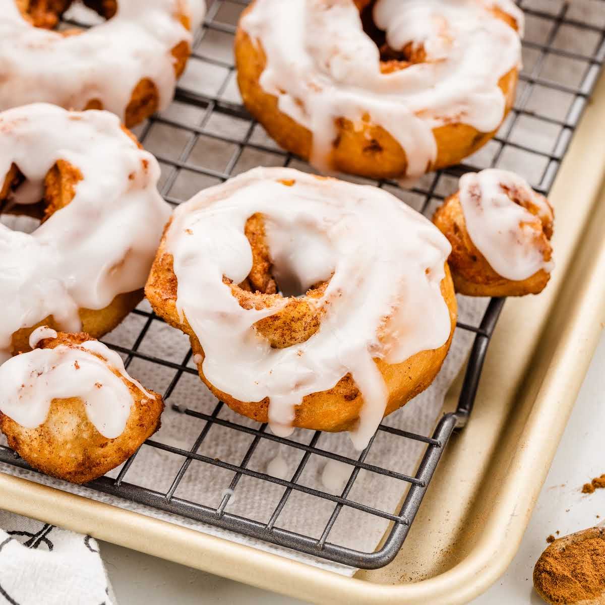 close up shot of Cinnamon Rolls Donut on a backing rack