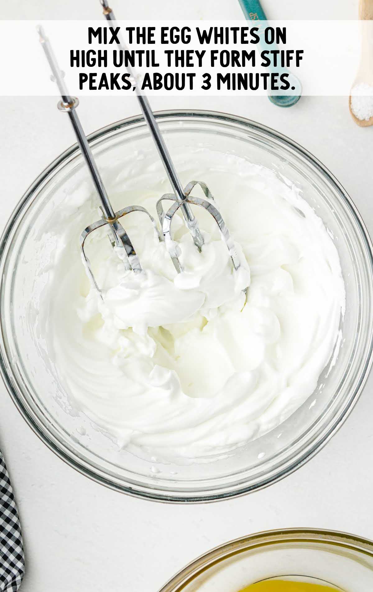 eggs whites whisked together in a bowl