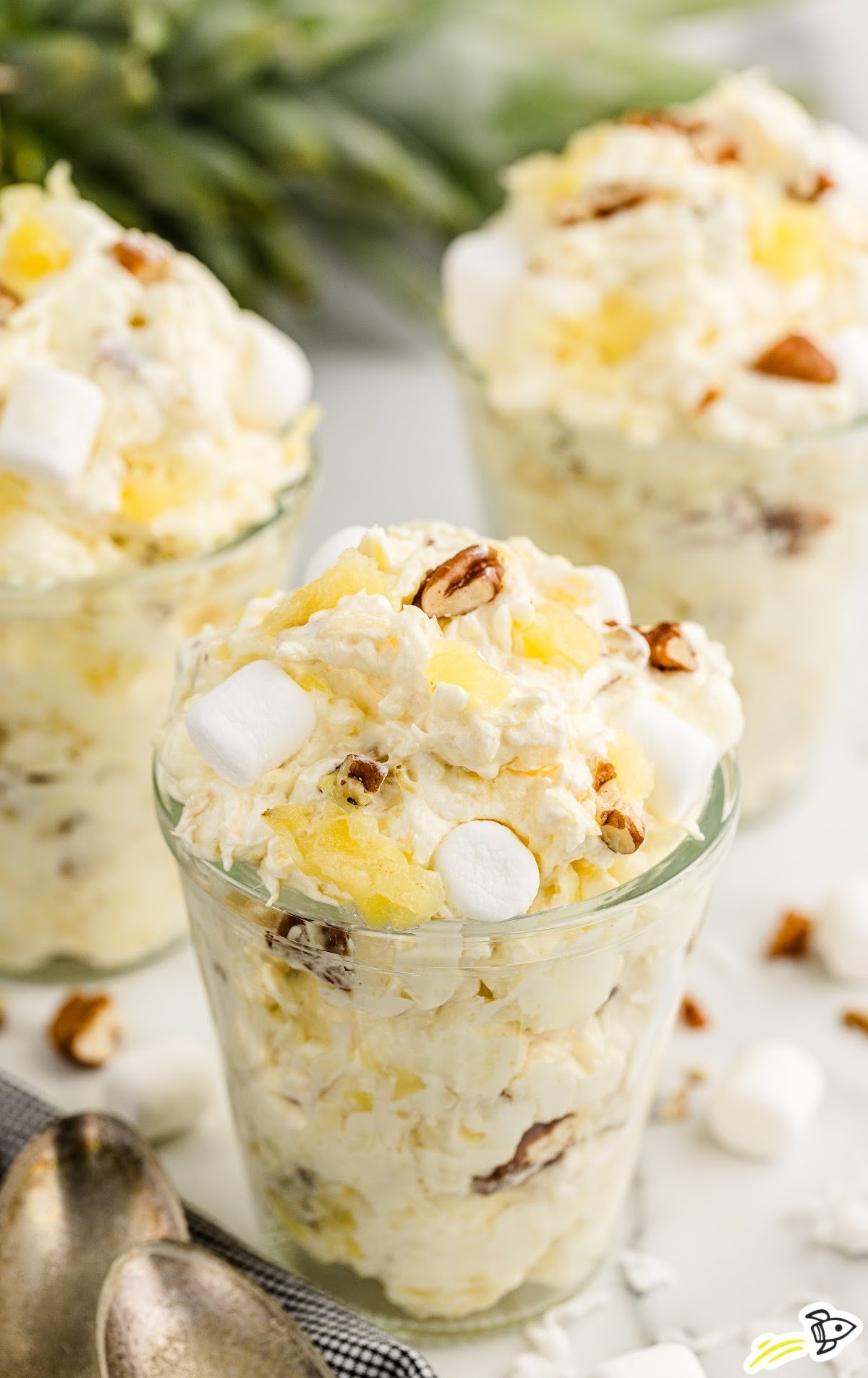 pineapple fluff with nuts, marshmallows, and pudding ready to eat