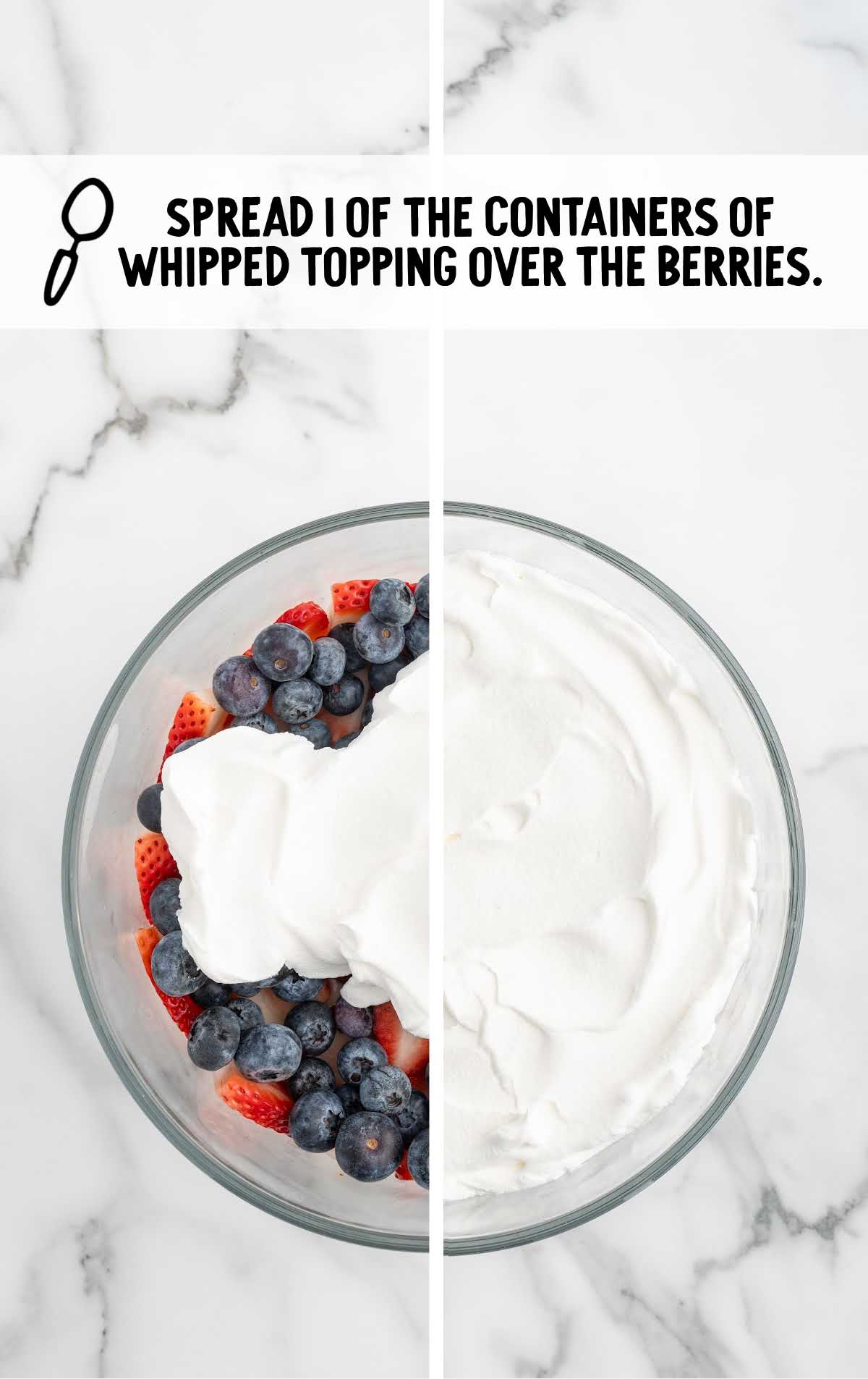 whipped topping spread over the berries