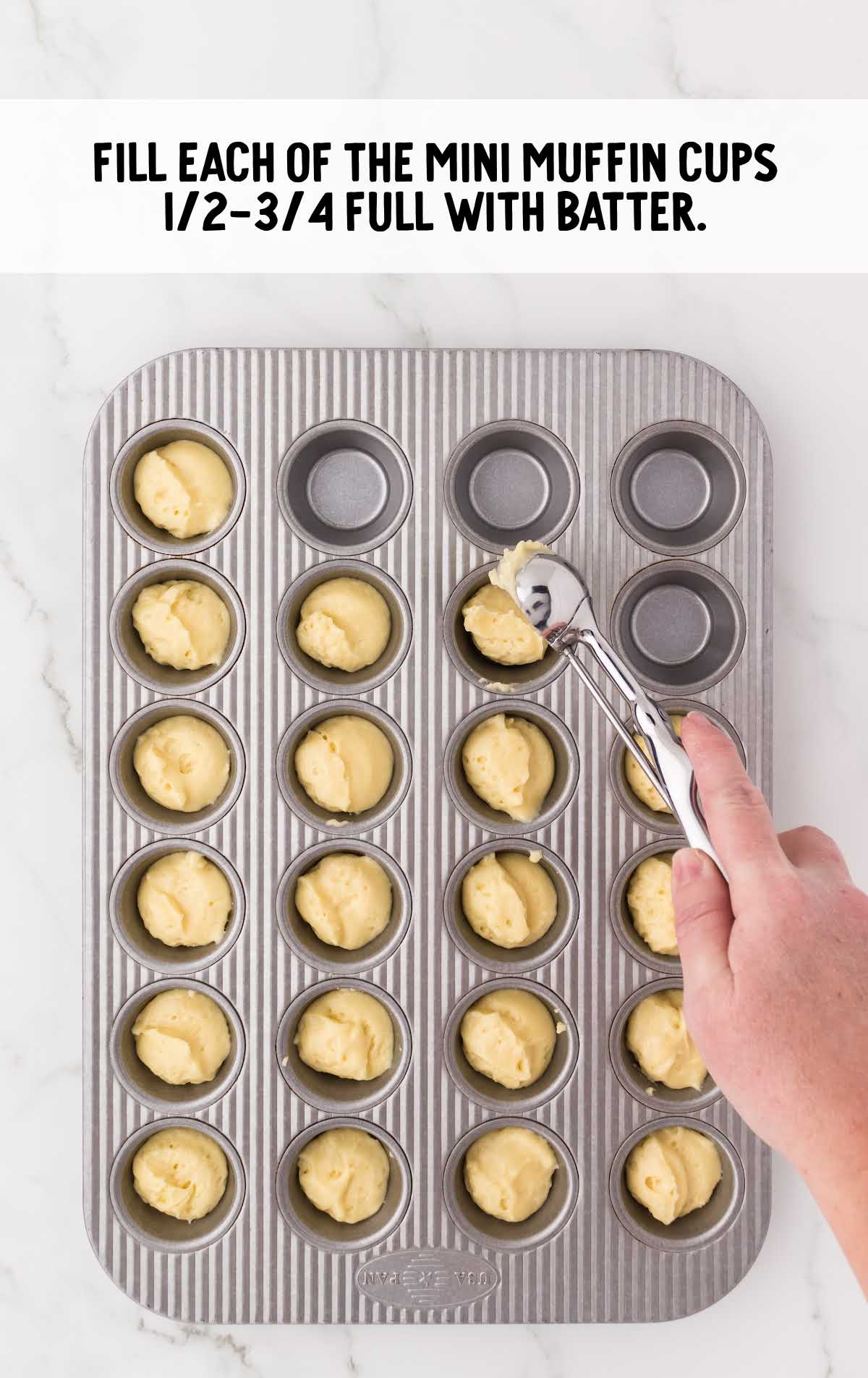 muffin pan filled with Lemon Drop Cake batter 																						 