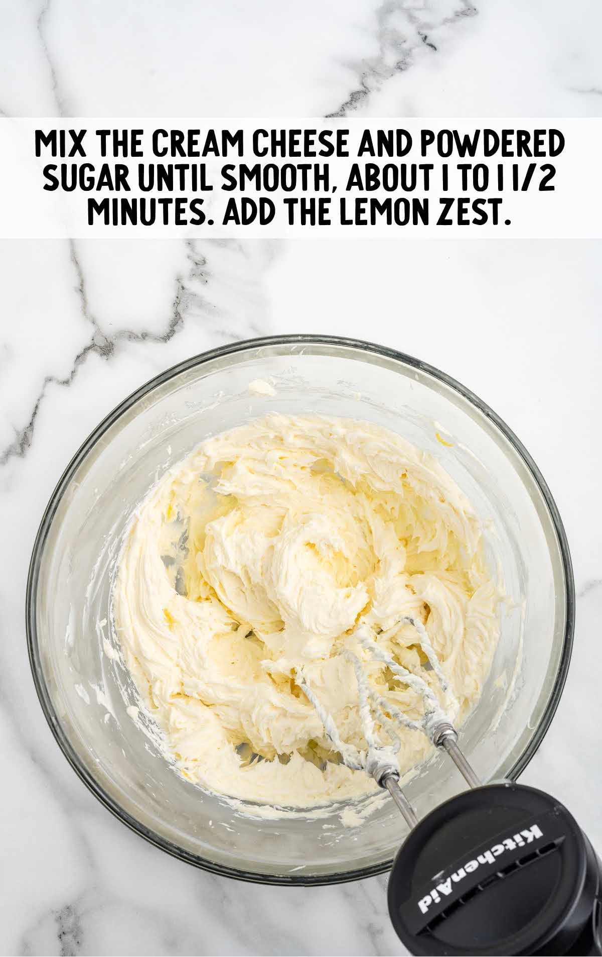 cream cheese, powdered sugar, and lemon zest blended together in a bowl