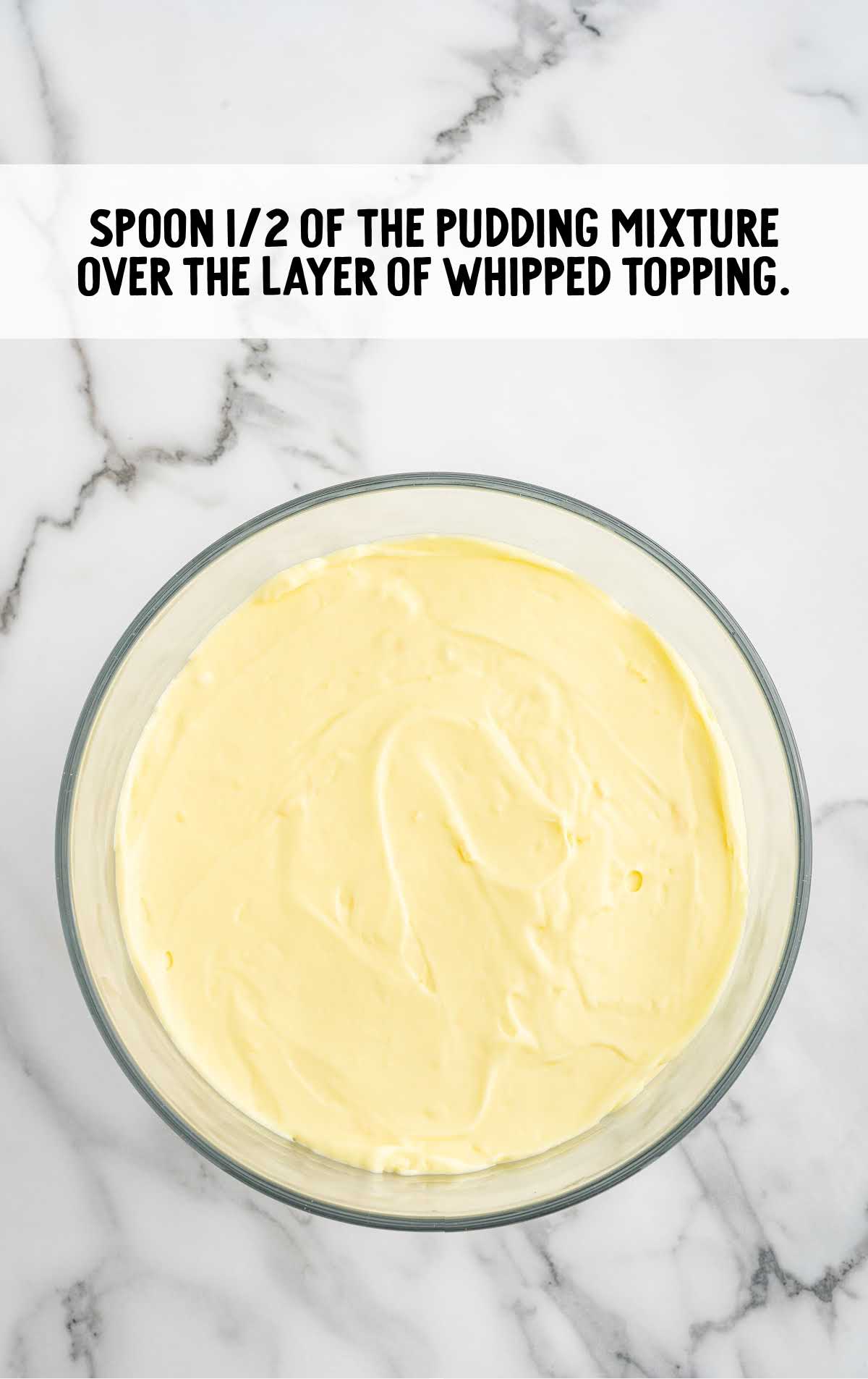 pudding mixture spooned over the whipped topping