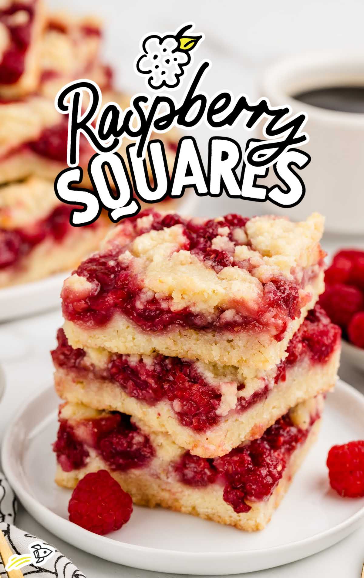 Raspberry Squares stacked on a plate