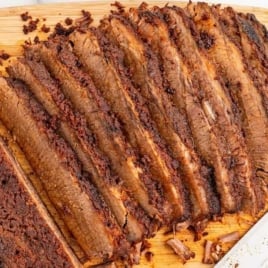 beef brisket sliced on a wooden board
