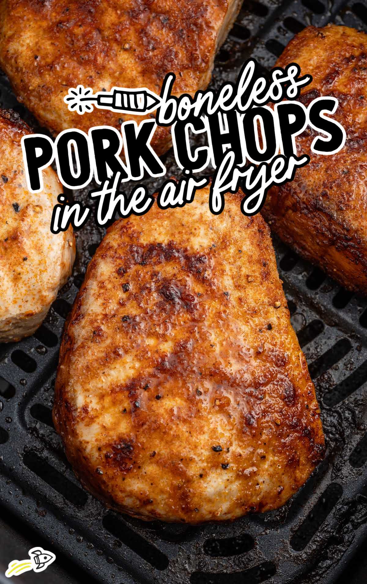 close up shot of Boneless Pork Chops in a air fryer
