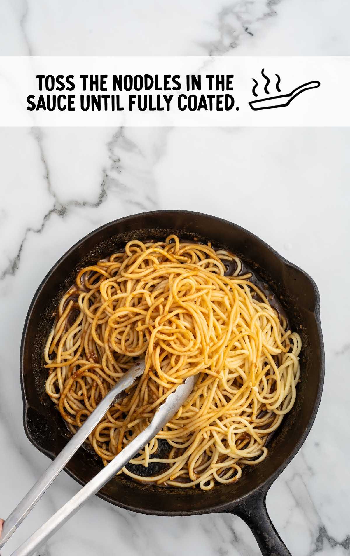 noodles tossed in the sauce until fully coated