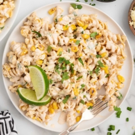 a plate of Mexican Street Corn Pasta Salad garnished with cilantro