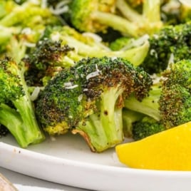close up shot of pieces of broccolis on a plate