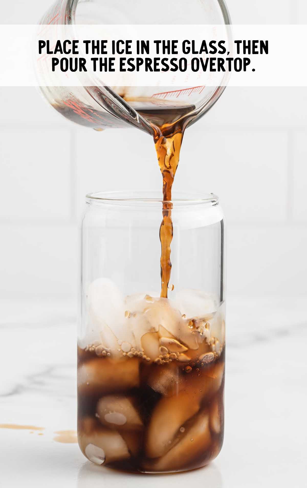 ice placed in a cup then espresso poured ontop