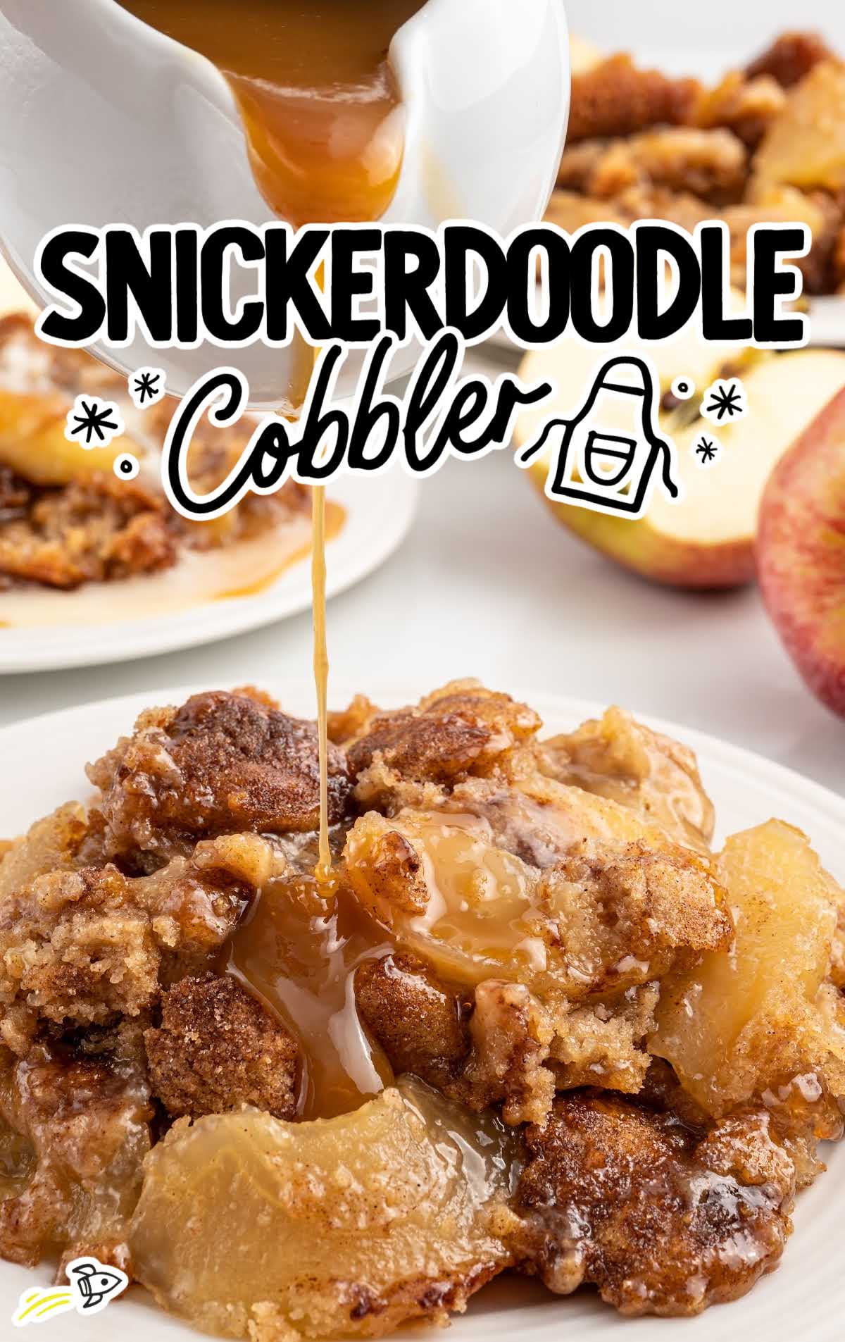 a close up shot of a piece of Snickerdoodle Cobbler on a plate drizzled with caramel