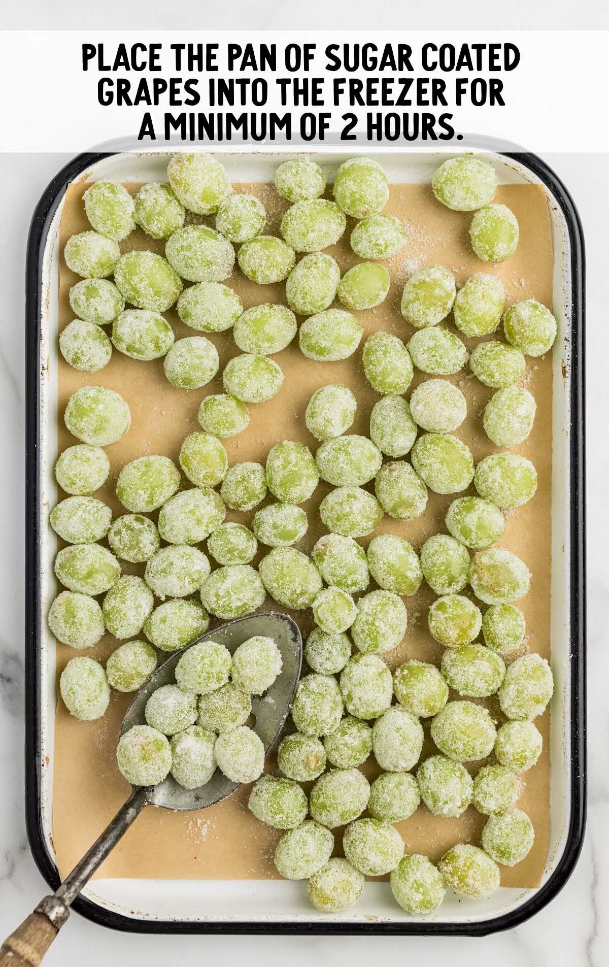 sugar coated watermelon White Claw grapes placed on a pan