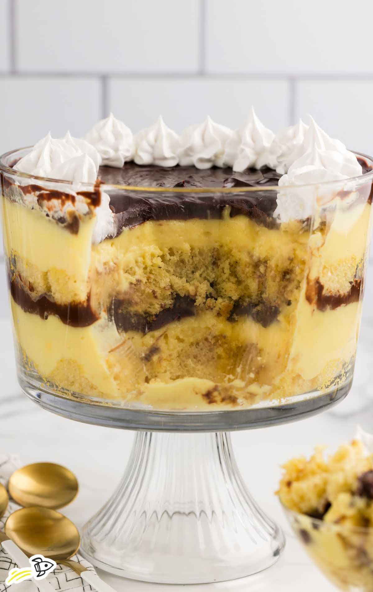 a jar of Boston Cream Pie Trifle with a slice missing