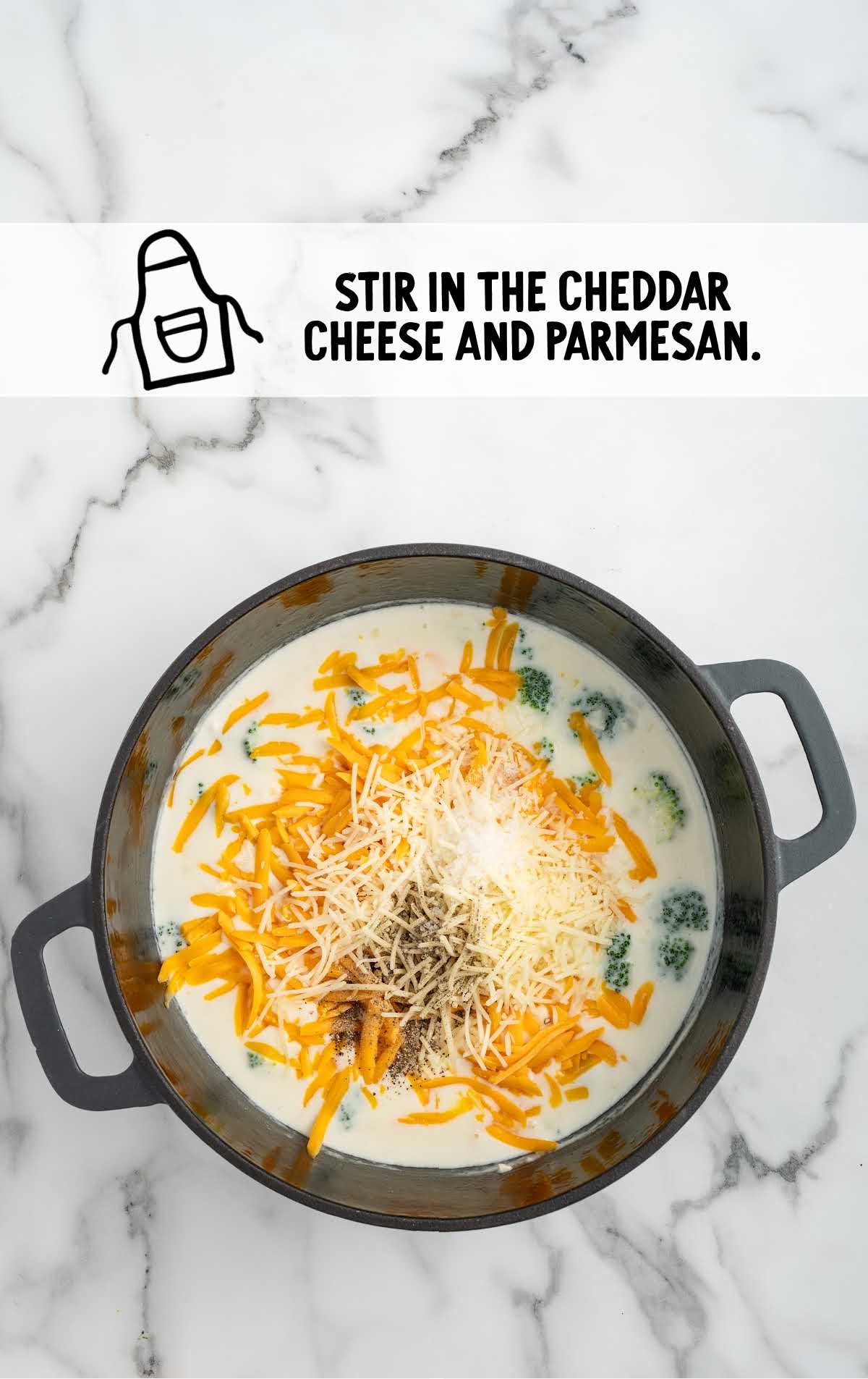 cheddar and parmesan cheese stirred into the pot of soup