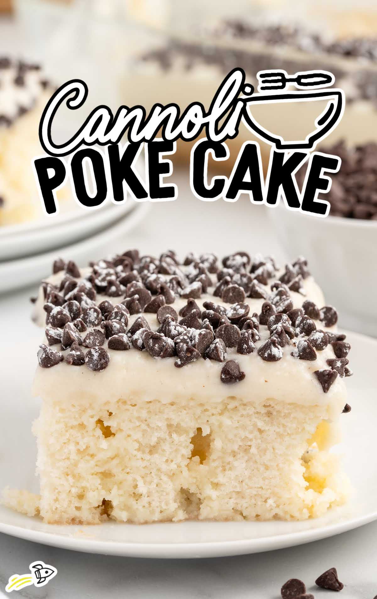 a slice of Cannoli Poke Cake on a plate