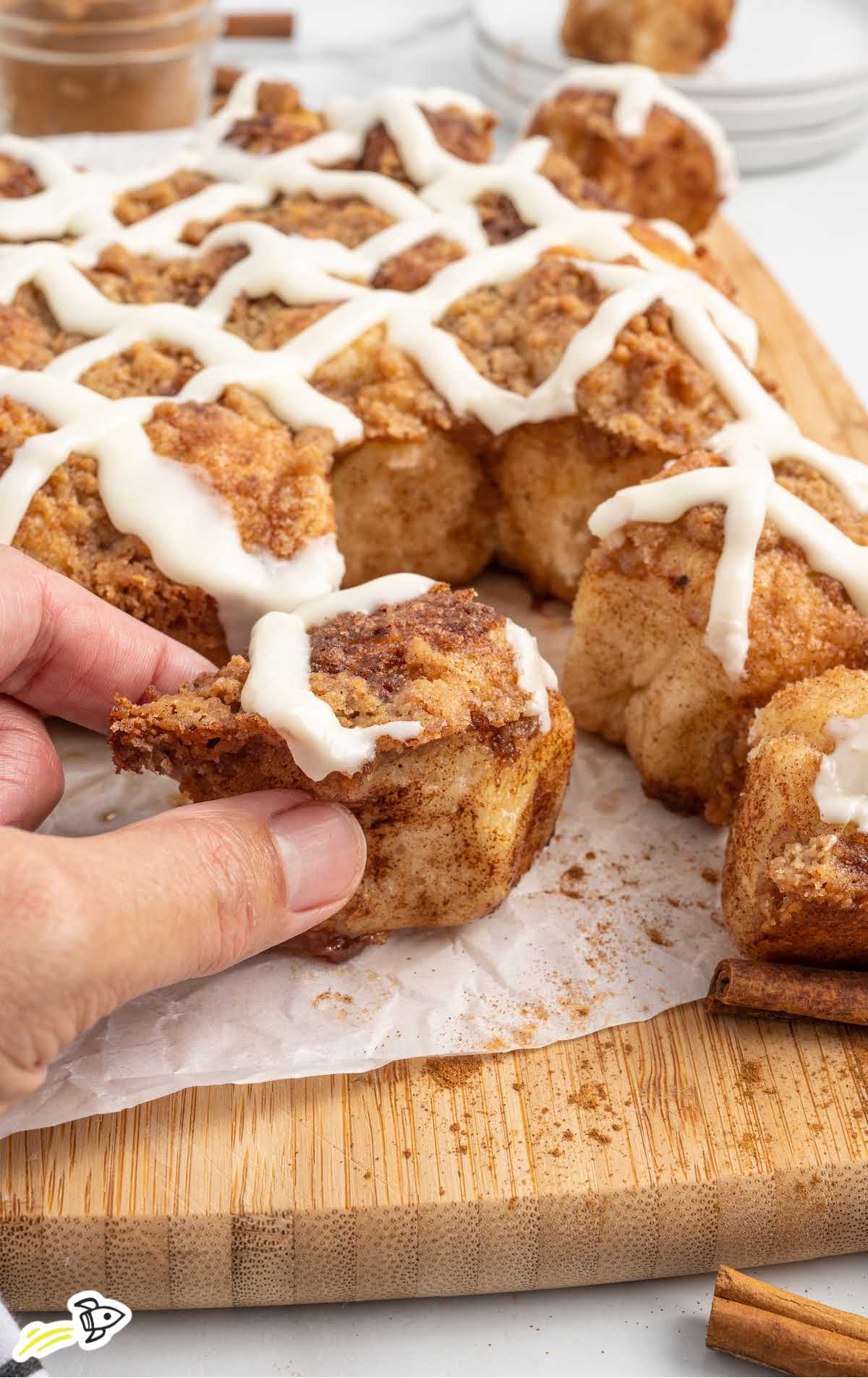 Cinnamon Pull Apart Bread on a wooden board