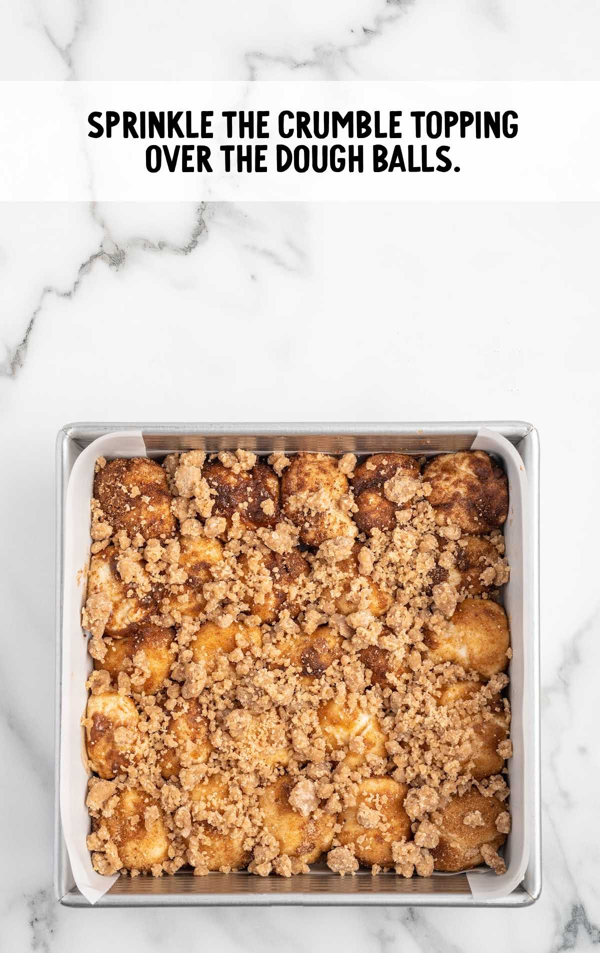 crumble topping sprinkled over the dough balls