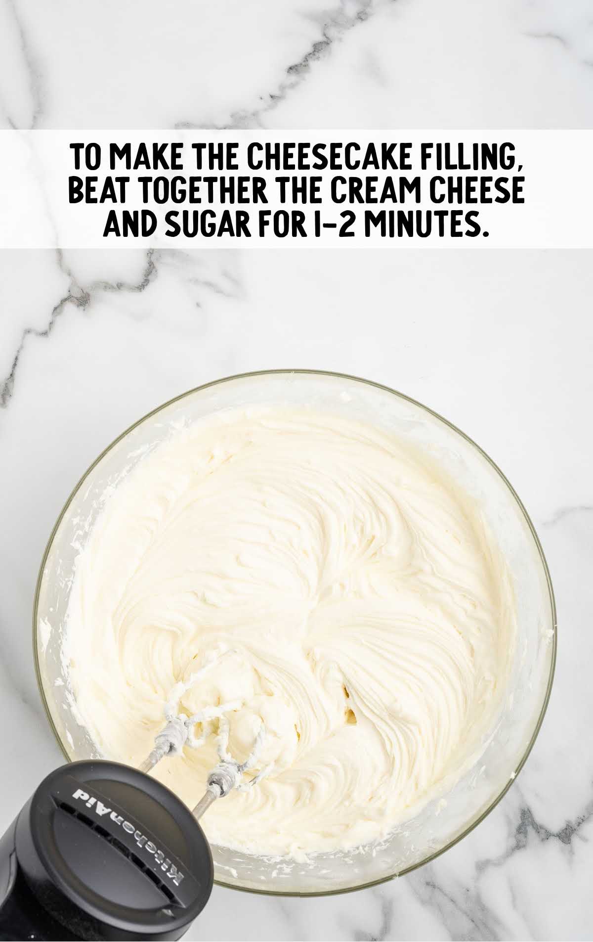 cream cheese and granulated sugar blended together in a bowl