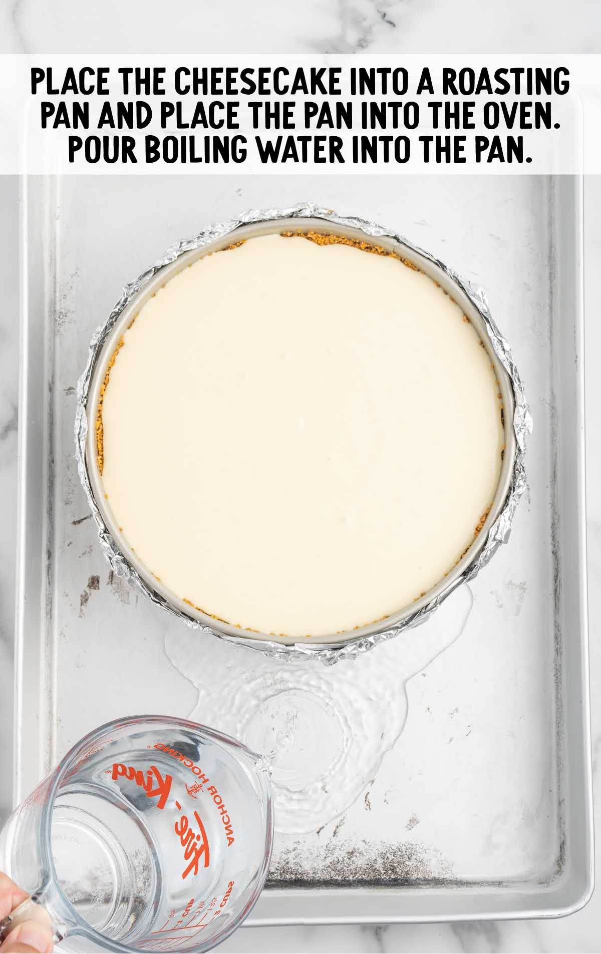 cheesecake placed into a roasting pan